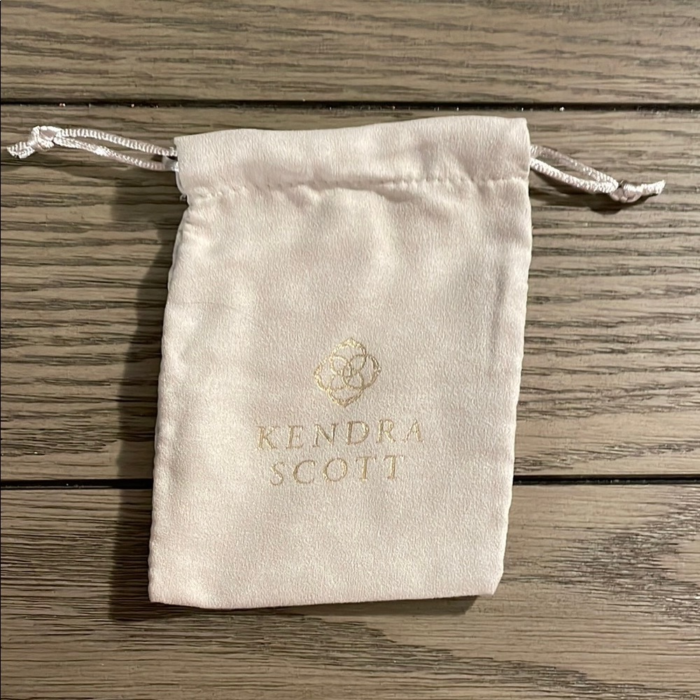 Kendra Scott Cream Pouch with Gold Logo